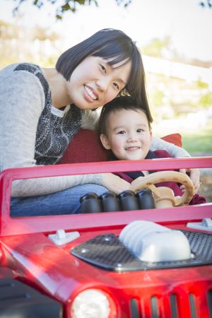 Chinese Mother Having Fun with Her Son