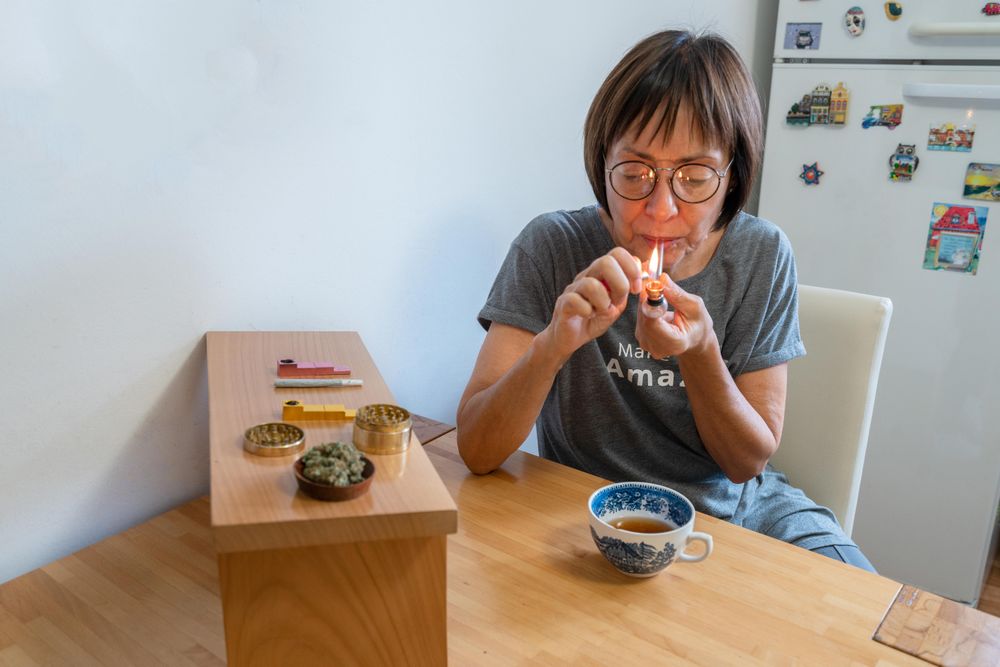 Mature woman smoking marijuana