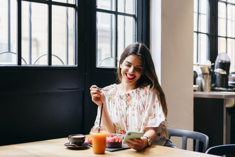 Smiling woman in cafe