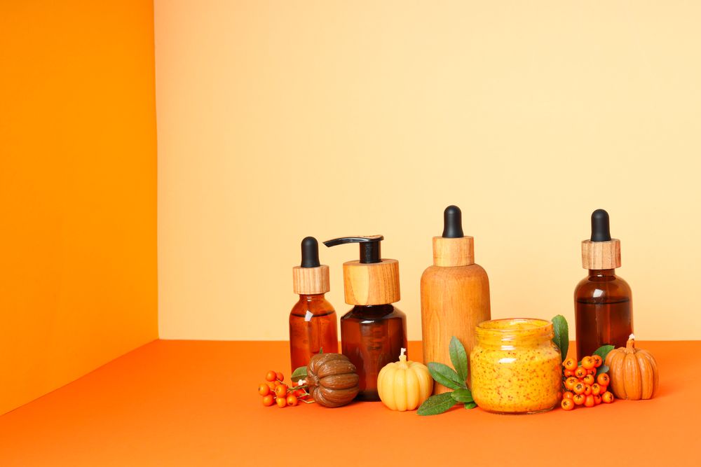 Skin care and face care concept - pumpkin cosmetic