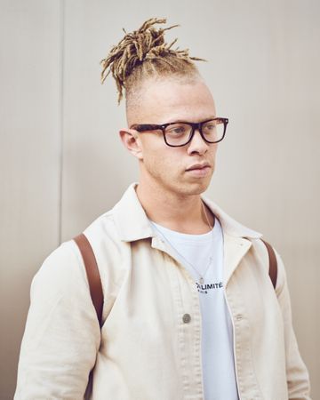 London, England, United Kingdom - September 15th, 2019: Portrait of man with blond dreadlocks