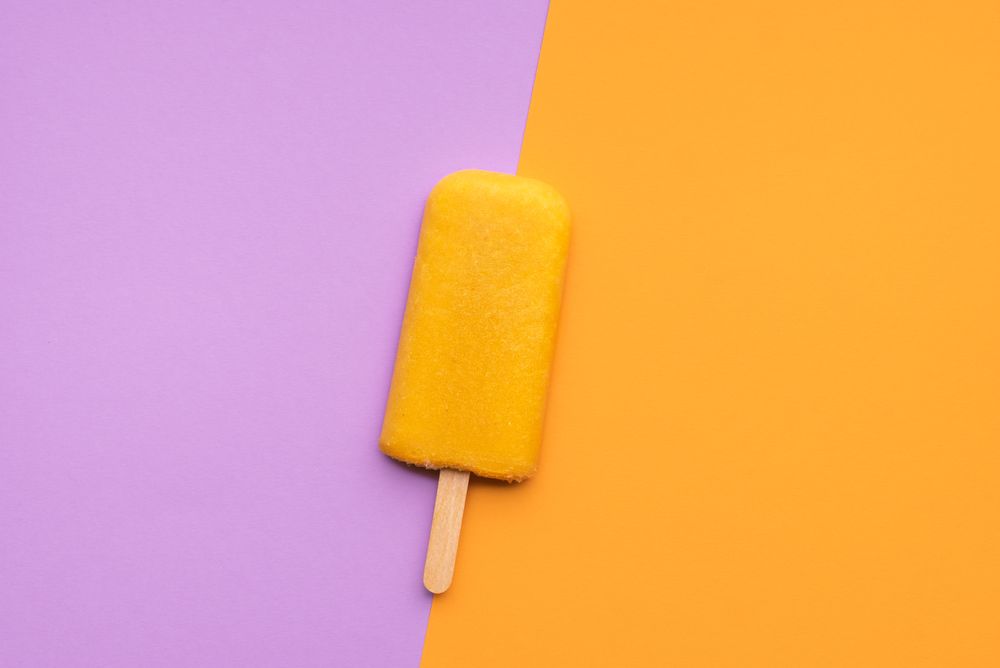 Orange popsicle ice cream vertical