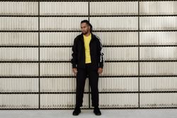 Black male near concrete blocks