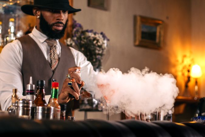 Signature cocktails: a creative bartender at his bar