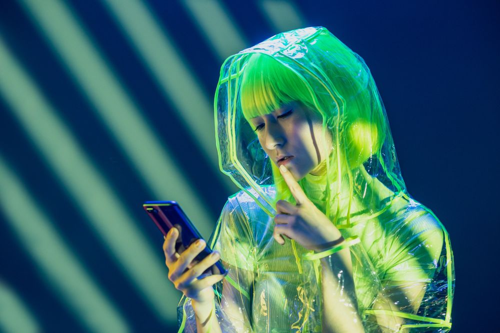 Asian young woman using phone