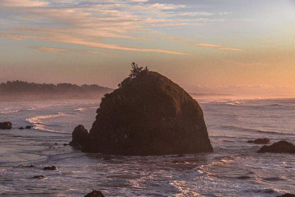 Rock out in the Pacific Ocean in late afternoon