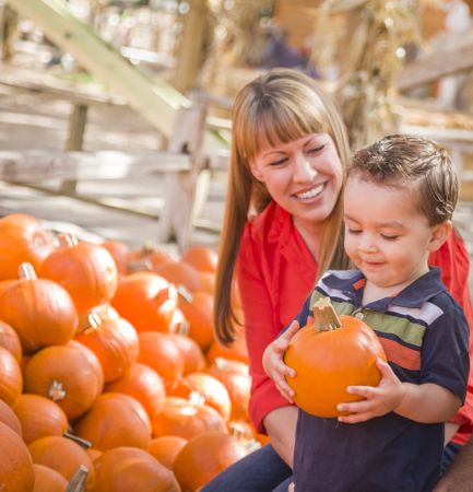 Happy Family at the Pumpkin Patch