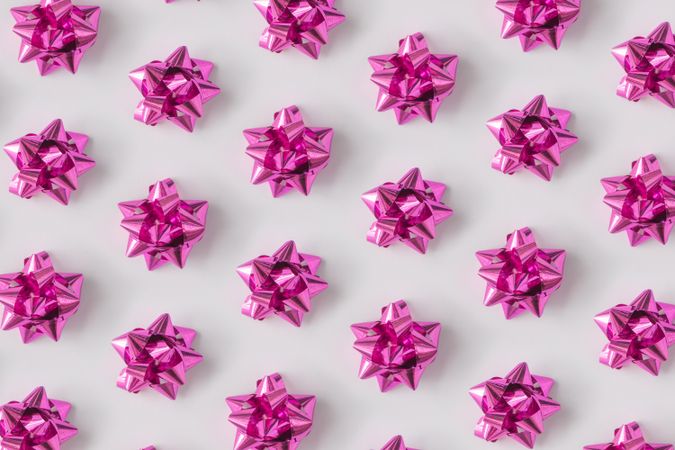Pattern of plastic pink decorative gift bows