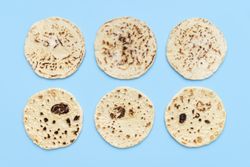 Indian bread above view on blue table
