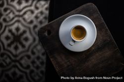 Top view of espresso cup on wooden tray 5l1pY4