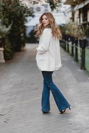 Charming woman posing on street