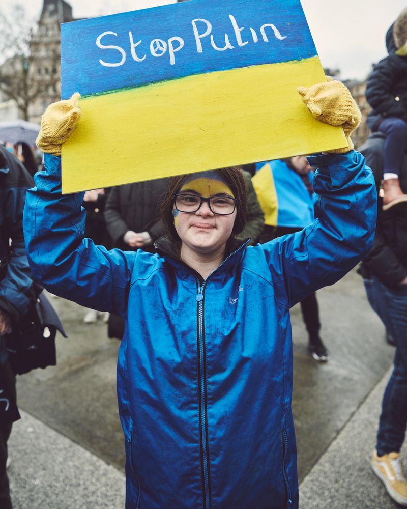 London, England, United Kingdom - March 5 2022: Woman holding “Stop Putin” sign at protest