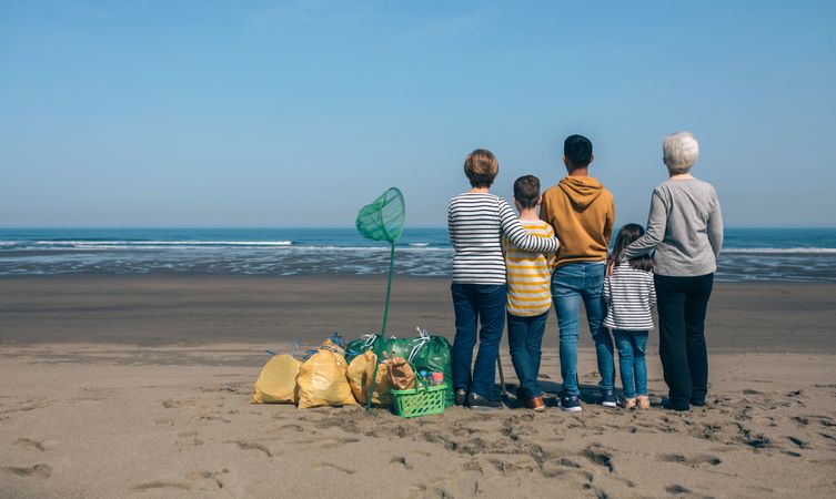 Volunteers backwards watching the sea