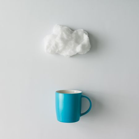 Cup of coffee with cotton wool cloud