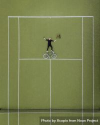Aerial view of man laying beside a bicycle on tennis court 5w8WL4