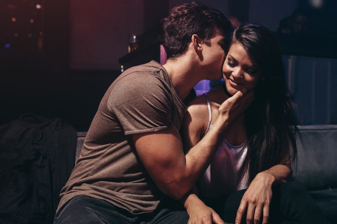 Romantic young couple at nightclub