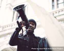 London, England, United Kingdom - June 6th, 2020: Man with loudspeaker 4Odqgb