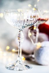 Champagne glass on Christmassy table