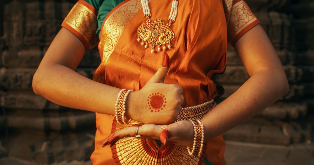 Close-Up of an Indian Female Dancer Displaying Symbolic Gesture with Expressive Face