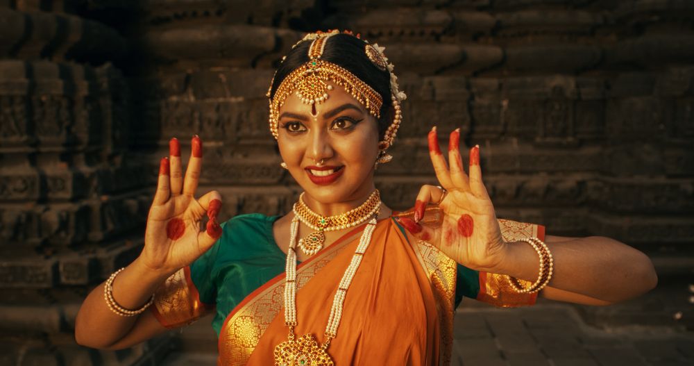 Close-Up Shot of the Legs of an Indian Female Dancer Doing a Folkloric Dance.