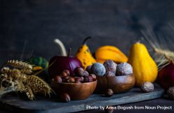 Side view of autumnal foods on wooden table 0WyKr4