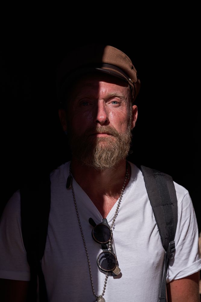 Confident bearded man in trendy clothes