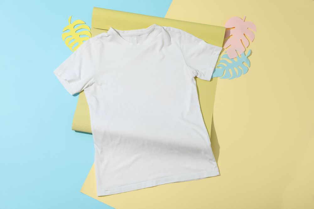 Blank plain t-shirt on two tone background, space for text