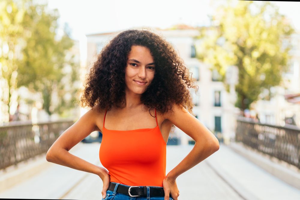stylish female with curly hair portrait
