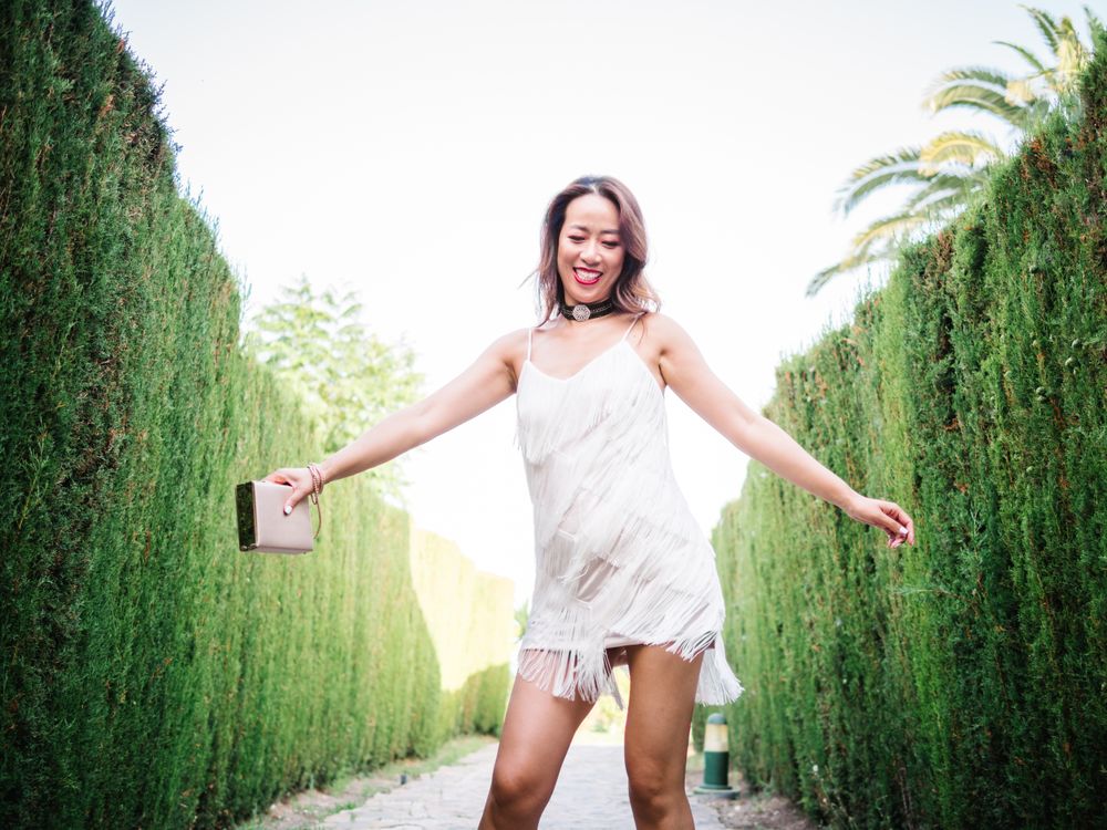 Young elegant Asian woman at a luxurious resort