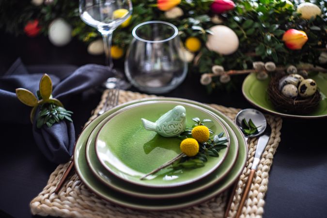 Decorative bird on plate for Easter table setting