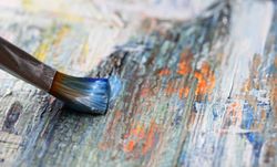 Closeup of brush on canvas