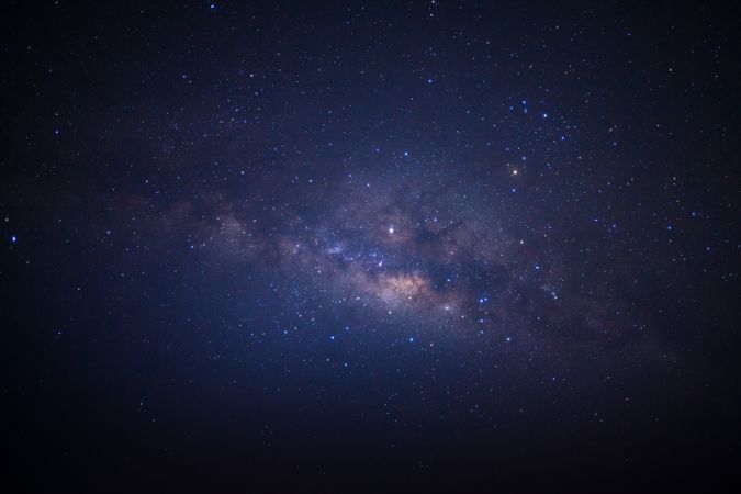 The milky way galaxy with stars and space dust in the universe, Long exposure photograph, with grain