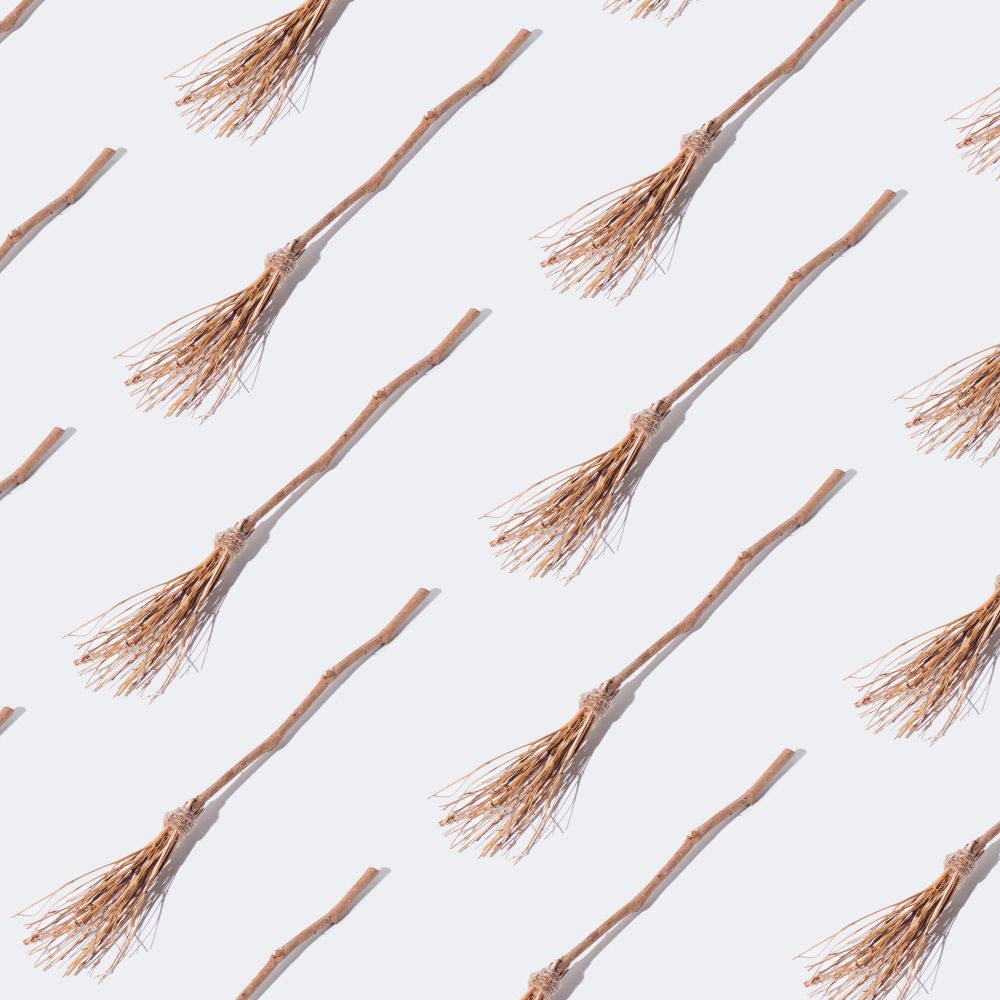 Broomstick pattern on light background