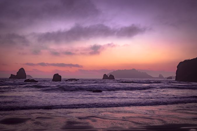 Rocks sitting out from Northern Californian coast at dusk