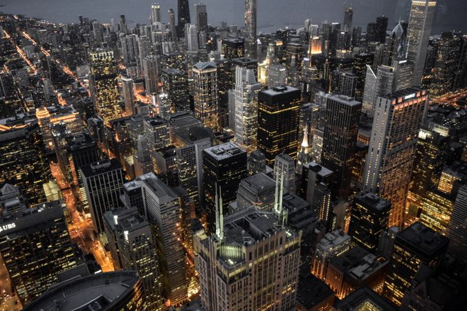 High angle view of city buildings during night time
