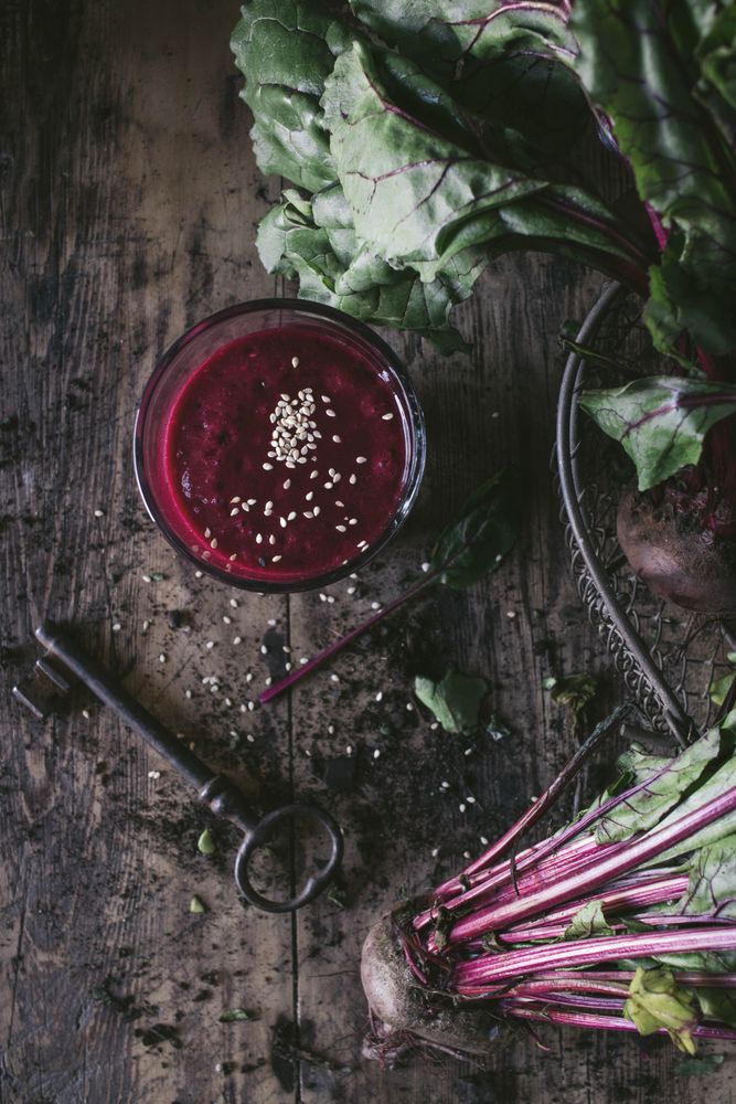 Beetroot and fresh smoothie on wooden table