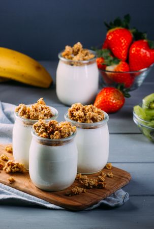 Glass bottles with milk and walnuts
