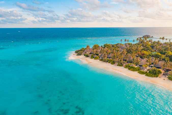 Drone shot of beach resort at sun set