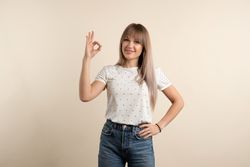 Woman showing okay gesture