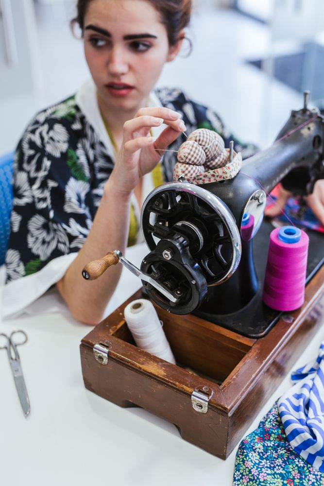 Woman in a sewing school