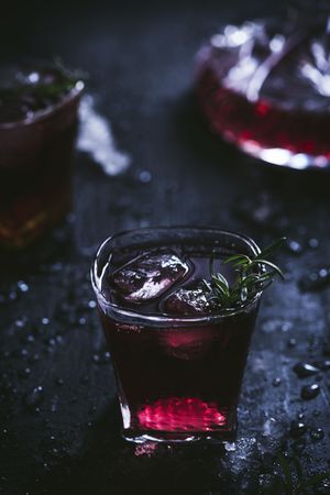 Glasses and carafe with red wine on table