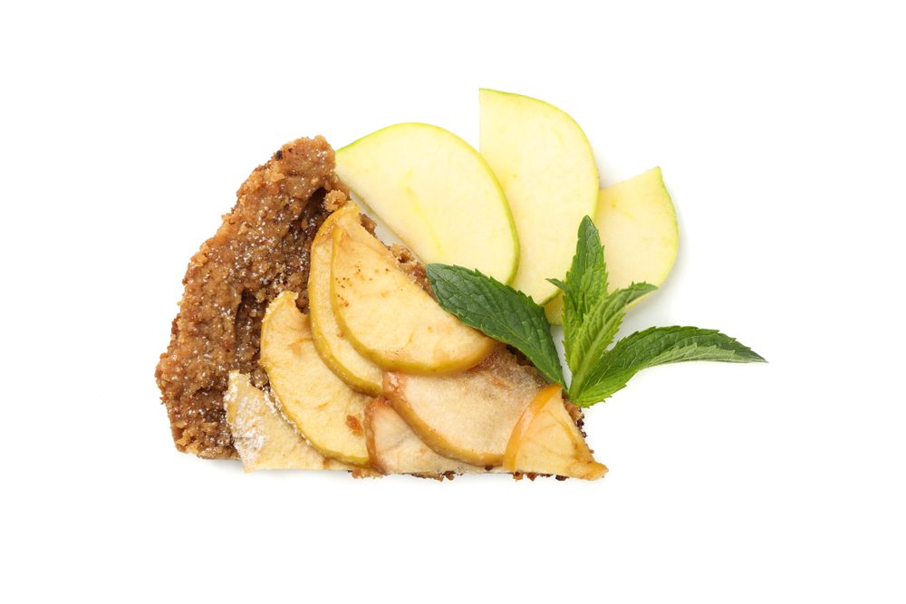 Piece of tasty apple pie isolated on neutral background. Homemade food