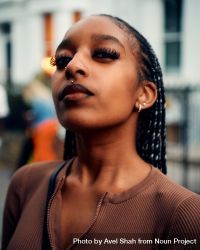 London, England, United Kingdom - August 28, 2022: Portrait of Black woman in brown shirt bxpAZb