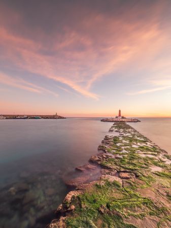 Rough path to islet with lighthouse