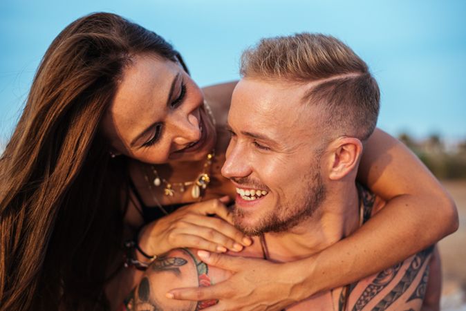 Joyful couple travelers having fun together outdoor