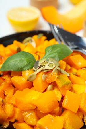 Concept of tasty homemade dish - baked pumpkin