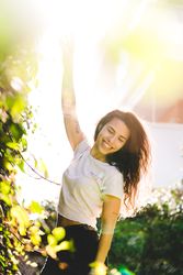 Cheerful woman in garden