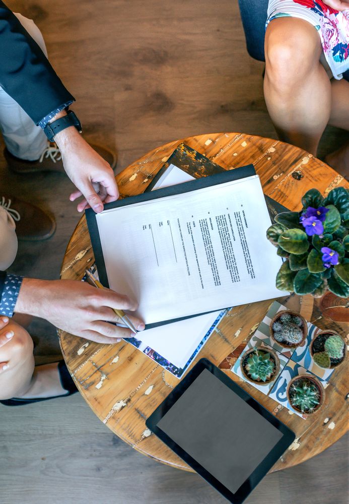 Top view of man ready to sign a document