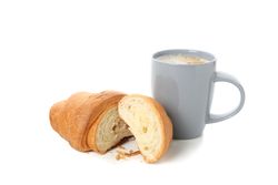 Side view of grey cup of coffee and croissant isolated on plain background