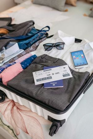 Businessman suitcase prepared for business trip